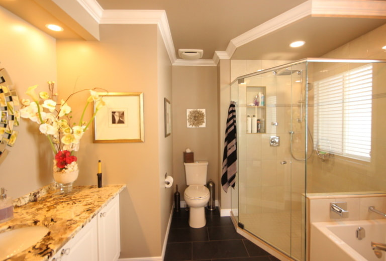 Bathroom renovation with custom neo angle shower and build-in bench in Barrhaven by Renovation to Perfection
