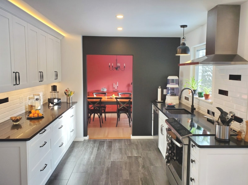 Custom kitchen renovation with black and white theme. LED under and above cabinet lights in Ottawa by Renovation to Perfection